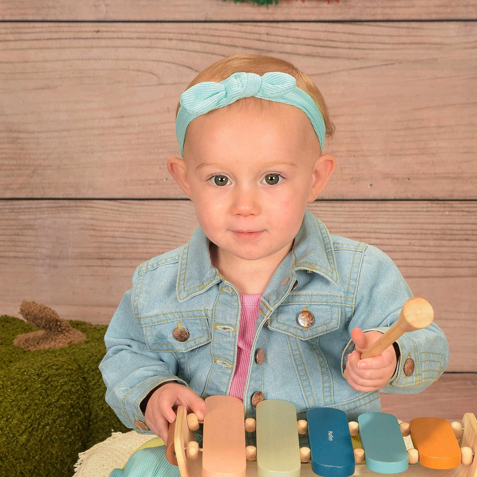 Faith is registered to the contest to win money with this photo: baby, blonde, bodypart, face, finger, hair, hand, happy, head, medication, musicalinstrument, person, photography, pill, plywood, portrait, smile, toy, wood, xylophone