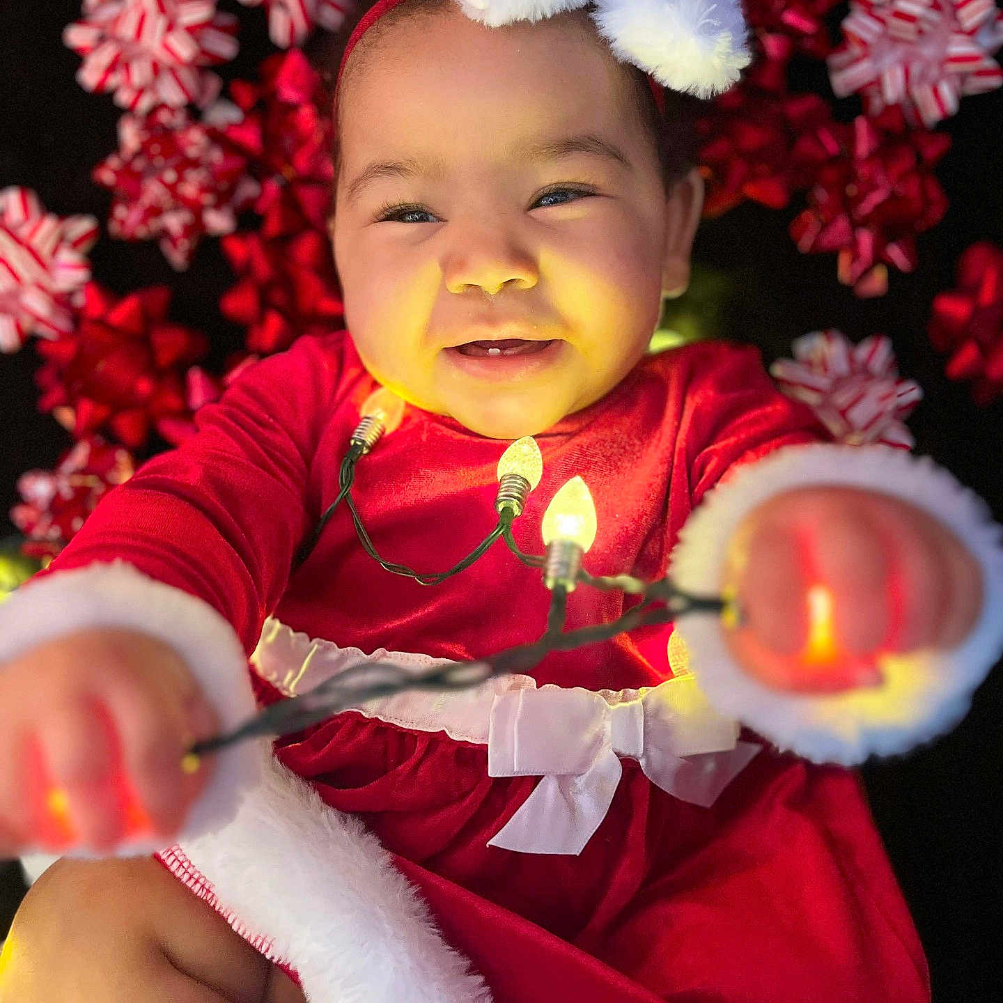 Araya joined the competition — help win amazing prizes! baby, clothing, coat, costume, cutlery, dress, face, flower, flowerarrangement, happy, head, jacket, lighting, person, petal, photography, plant, portrait, pottedplant, spoon