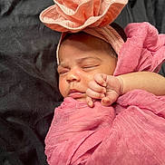 Aurora joined the competition — help win amazing prizes! newborn, baby, sleeping, pink, headband, flower, wrapped, blanket, soft, peaceful, infant, cute, portrait, closeup, skin, hand, resting, indoors, fabric, child
