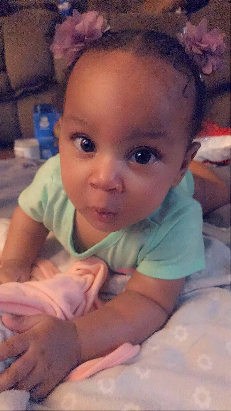 Charming is registered to the contest to win money with this photo: baby, black_hair, cheek, child, chin, ear, eye, eyebrow, face, forehead, head, human, lip, mouth, nose, person, skin, smile, surprise, toddler