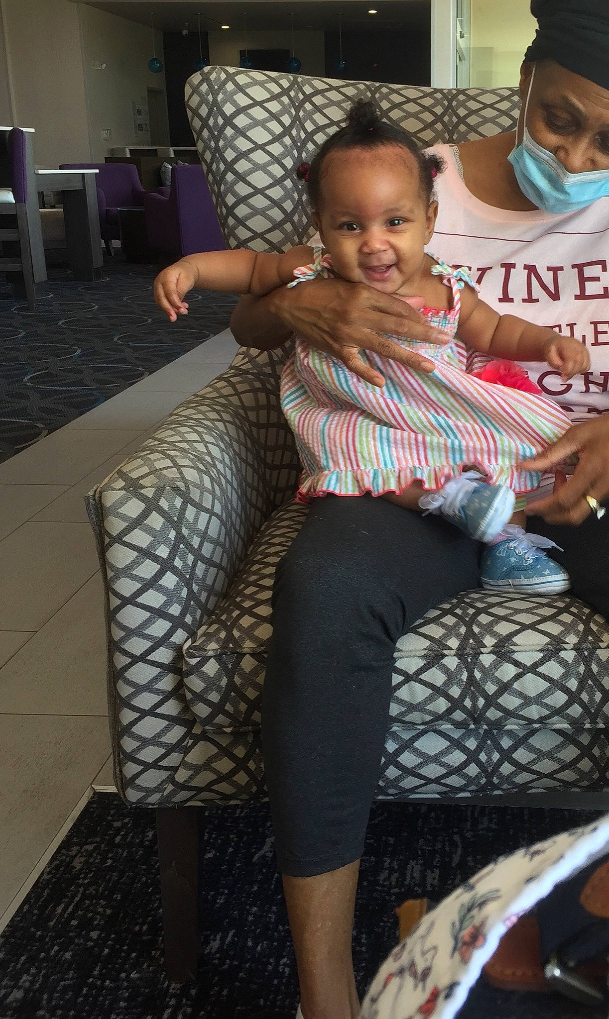 Charming is registered to the contest to win money with this photo: chair, child, furniture, leg, person, sitting