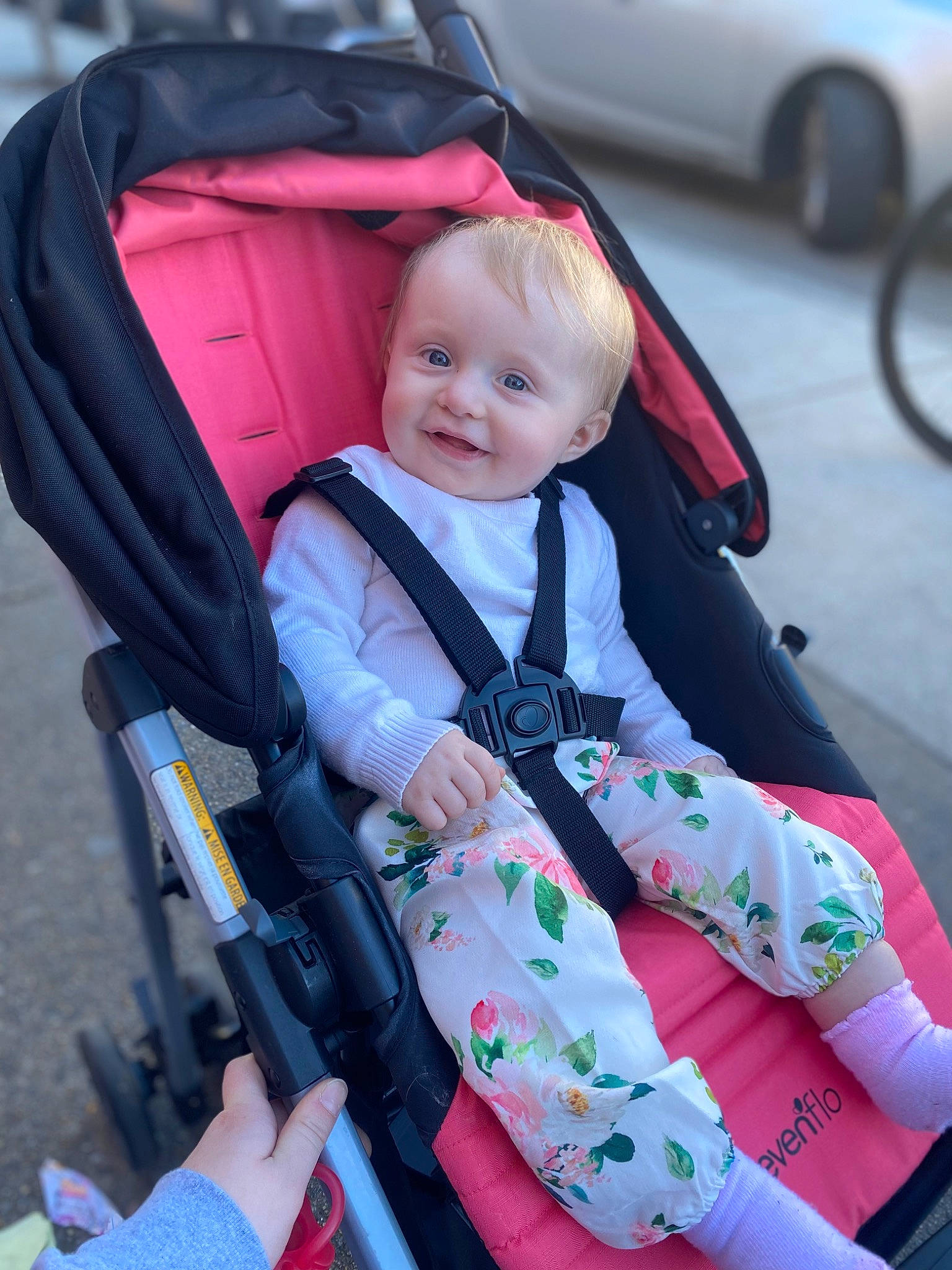 Lorelei is registered to the contest to win money with this photo: auto_part, automotive_tire, baby, baby_carriage, baby_products, baby_toddler_clothing, car_seat, child, electric_blue, eye, family_car, joy, luxury_vehicle, motor_vehicle, person, product, sitting, smile, tire, toddler
