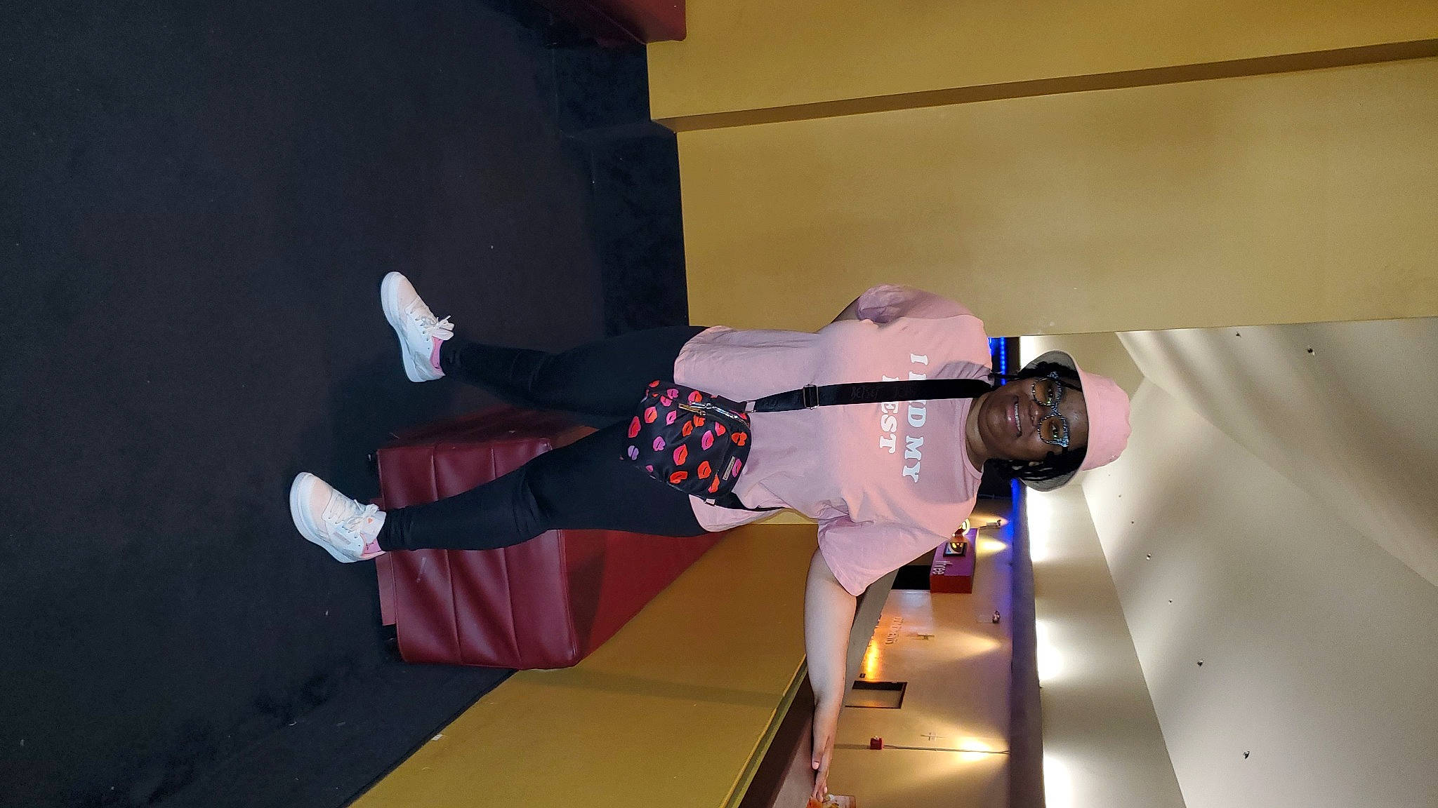 Mikayla is registered to the contest to win money with this photo: carmine, cleanliness, costume, elbow, fashion_design, flooring, fun, headwear, human_leg, joy, knee, person, recreation, sleeve, sock, sportswear, thigh, walking_shoe