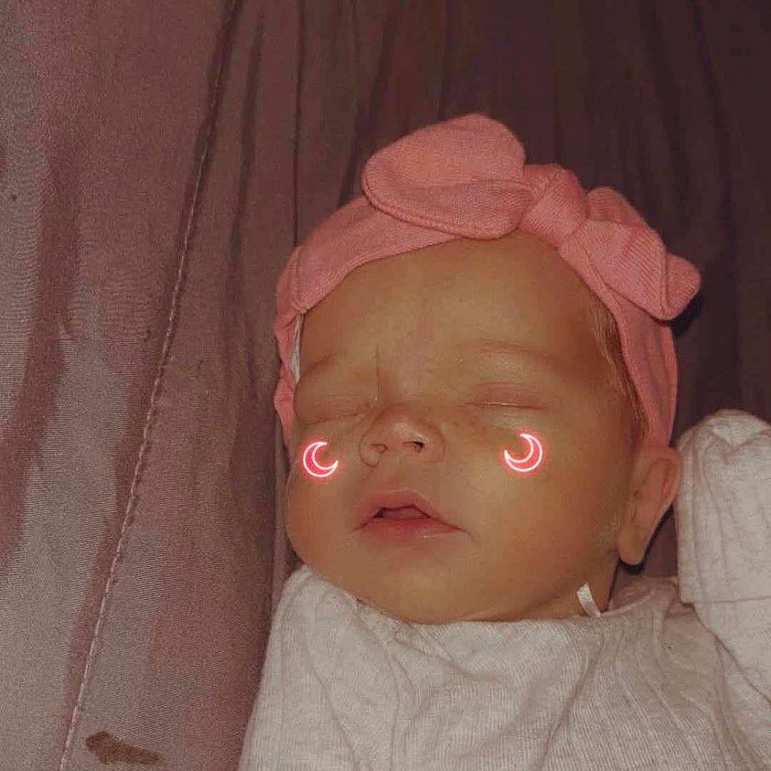 Celina is registered to the contest to win money with this photo: baby, bow, child, closed_eyes, clothing, crescent_moon, cute, fabric, face, glowing, headband, infant, neon, peaceful, pink, portrait, resting, sleeping, soft, white