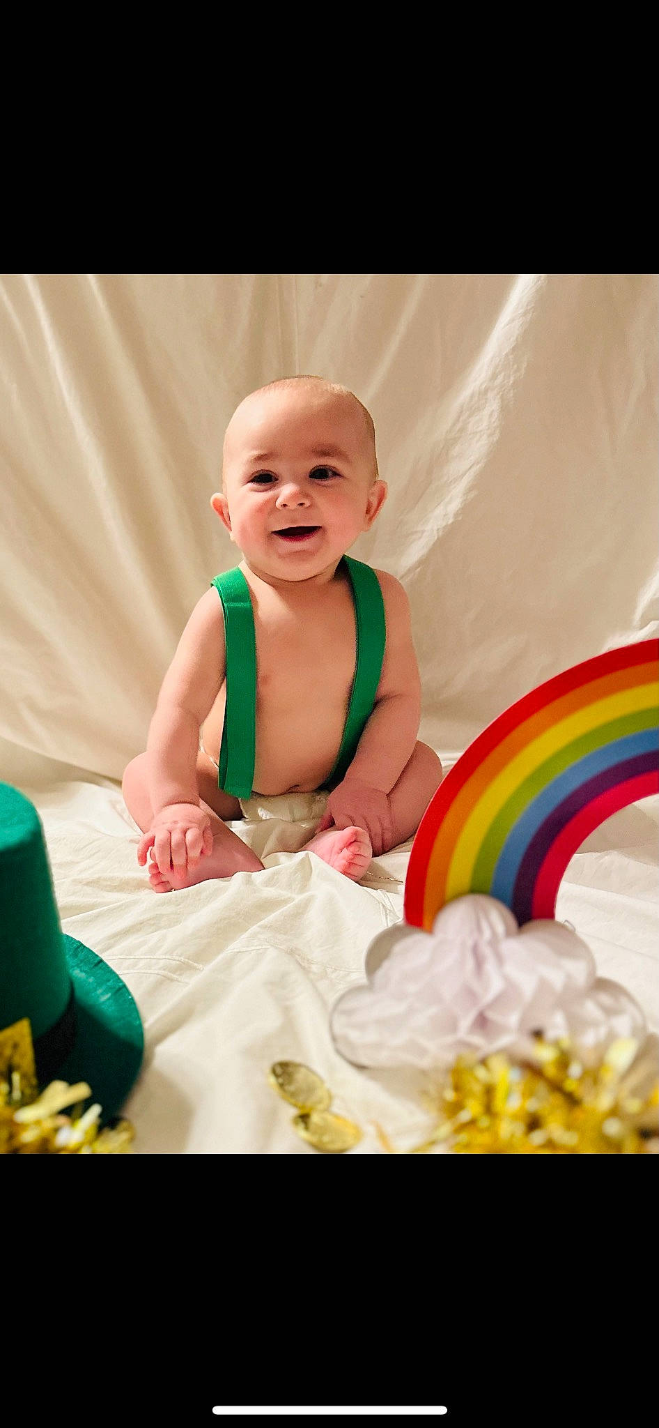 Kayden is registered to the contest to win money with this photo: baby, baby_products, baby_toddler_clothing, child, event, flash_photography, fun, happy, joy, leisure, party, person, play, portrait_photography, product, rainbow, shorts, sitting, smile, sweetness
