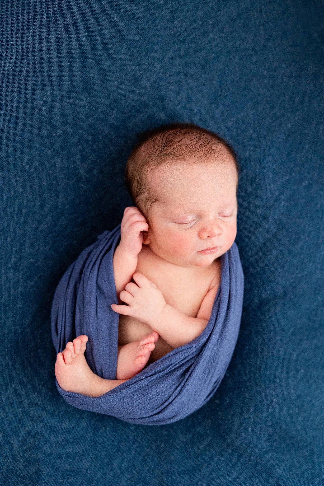 Oliver is registered to the contest to win money with this photo: baby, baby_products, baby_toddler_clothing, barefoot, cheek, child, comfort, elbow, electric_blue, flash_photography, foot, gesture, linens, magenta, nail, person, sitting, stomach, textile, thumb