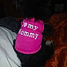 dog, black_dog, pet, pink_shirt, clothing, shirt, i_love_my_mom, bed, blanket, bedding, indoors, home, cozy, fluffy, black_fur, lying_down, portrait, flash_photography, pet_fashion, cute