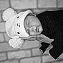 Hanaë participe au concours pour gagner de l'argent avec cette photo : baby, sleeping, hat, pom_poms, knitwear, hand, face, black_and_white, portrait, cute, child, soft_focus, brick_wall, cozy, newborn, peaceful, person, clothing, resting, indoor