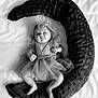 baby, infant, dress, headband, plush, pillow, crescent, black_and_white, portrait, soft_focus, baby_clothing, cute, sleeping_area, tulle, newborn, lying_down, indoors, child, adorable, calm