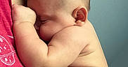 Finnegan joined the competition — help win amazing prizes! arm, baby, child, closeup, comfort, cuddling, diaper, face, head, hugging, human, indoor, infant, love, parent, person, red_shirt, skin, sleeping, tenderness