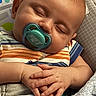 baby, sleeping, pacifier, hands, blanket, clothing, infant, peaceful, cute, closeup, face, child, resting, soft, cozy, portrait, indoor, newborn, comfort, relaxation