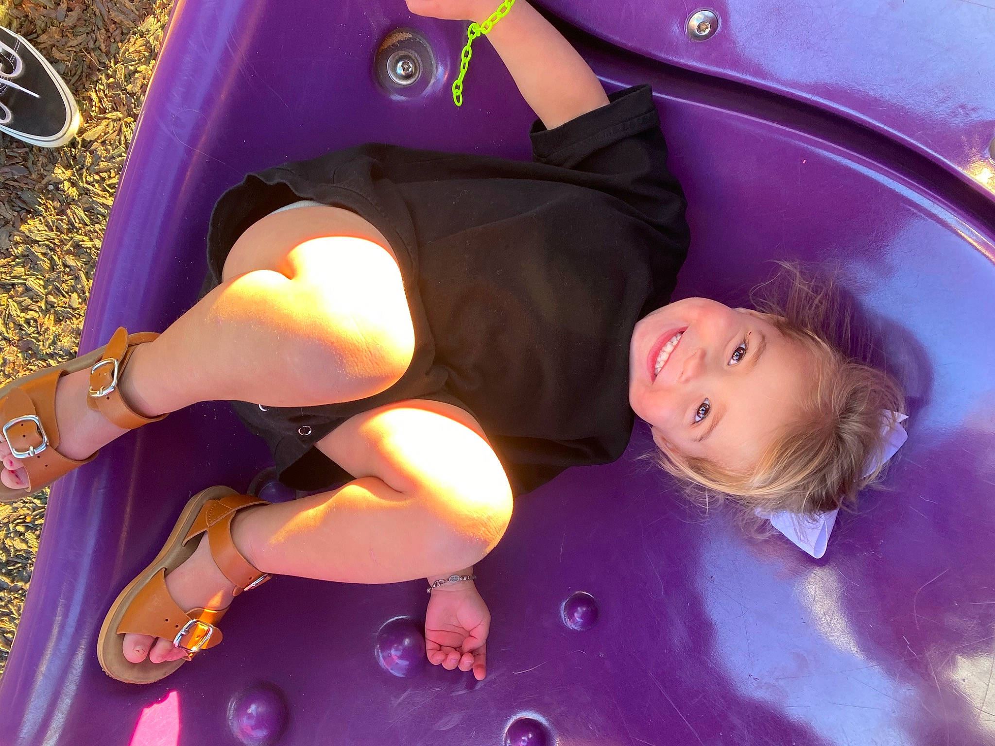 Laura joined the competition — help win amazing prizes! black_hair, blond, electric_blue, flooring, foot, fun, happy, human_leg, knee, leg, leisure, magenta, pink, purple, shorts, sitting, sneakers, thigh, vehicle_door, yellow