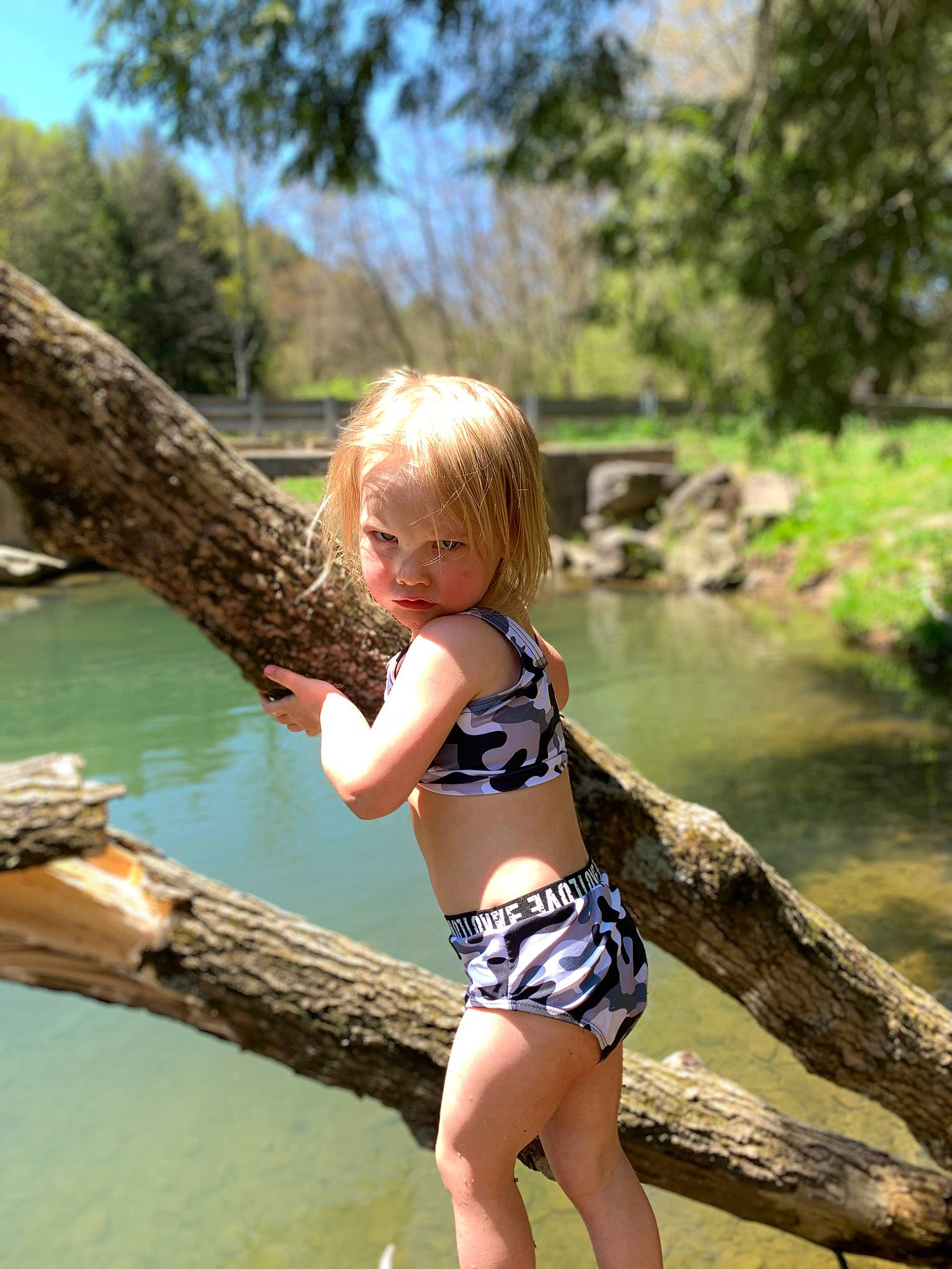 Rebel joined the competition — help win amazing prizes! barefoot, fawn, foot, grass, happy, human_leg, lake, leisure, long_hair, nature, people_in_nature, person, plant, sky, summer, thigh, tree, trunk, waist, water