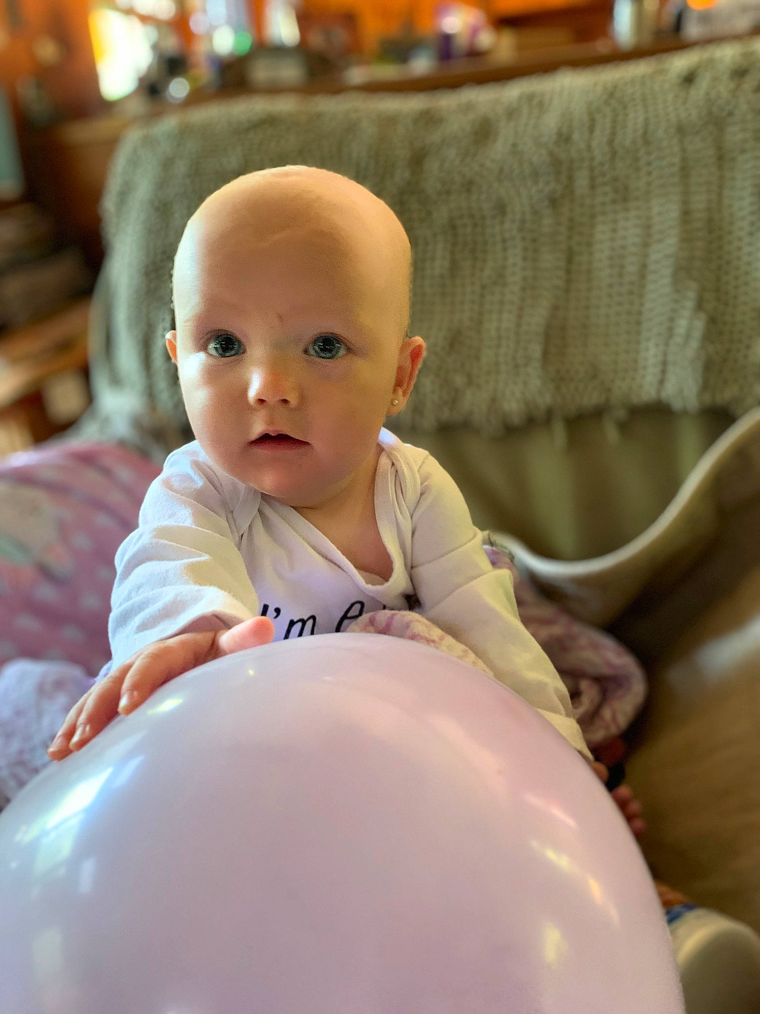 Camri joined the competition — help win amazing prizes! baby, baby_toddler_clothing, cheek, chest, child, chin, comfort, flooring, fun, hairstyle, happy, head, human_leg, leisure, person, room, sitting, skin, smile, thumb