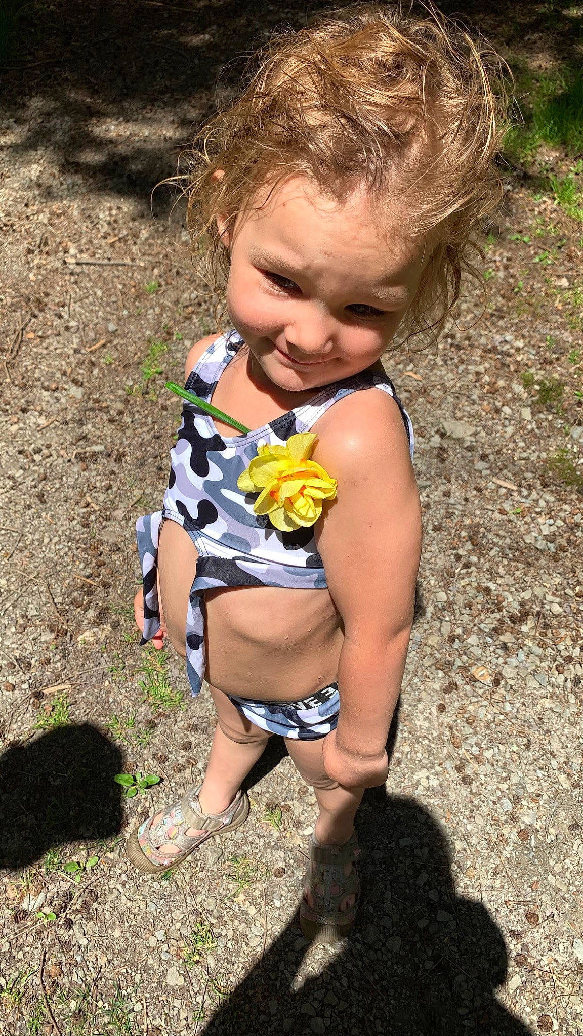 Waylynn is registered to the contest to win money with this photo: baby_toddler_clothing, blond, child, face, fawn, fun, grass, hairstyle, happy, head, human_leg, iris, joy, leg, people_in_nature, person, plant, smile, soil, thigh
