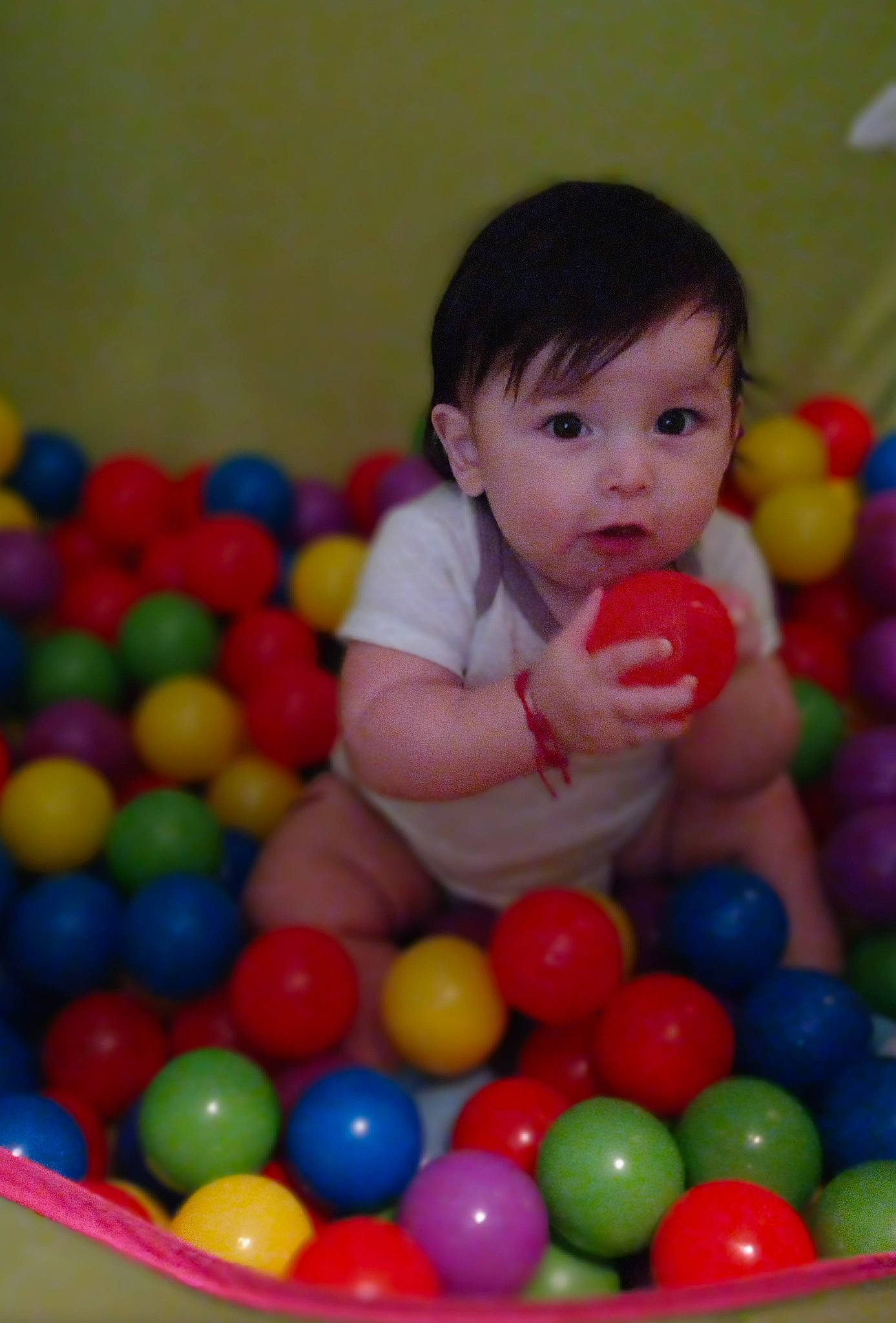 Elior is registered to the contest to win money with this photo: baby, baby_playing_with_toys, baby_products, baby_toys, ball, ball_pit, cheek, child, comfort, event, fun, happy, leisure, person, play, playground, recreation, room, sitting, surprise