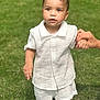 toddler, child, white_clothing, shorts, shirt, holding_hand, grass, outdoor, daylight, young_child, standing, baby, person, cute, summer, nature, skin, portrait, curious, hand