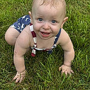 Ryler joined the competition — help win amazing prizes! baby, child, grass, outdoor, crawling, blue_eyes, smiling, face, skin, summer, patriotic_clothing, one_person, closeup, nature, happy, cute, hands, legs, infant, play