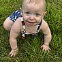 baby, child, grass, outdoor, crawling, blue_eyes, smiling, face, skin, summer, patriotic_clothing, one_person, closeup, nature, happy, cute, hands, legs, infant, play