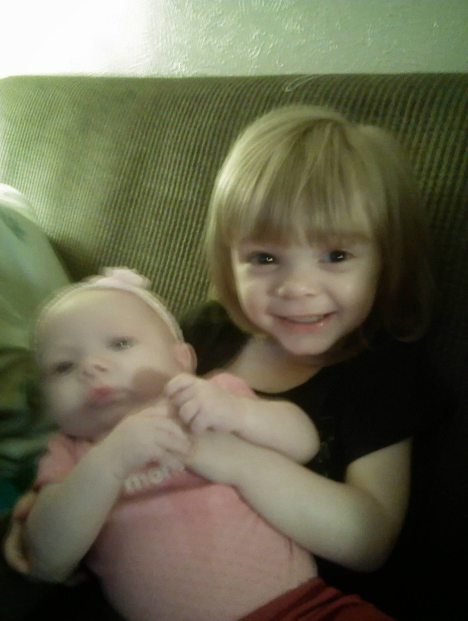 Makenzie joined the competition — help win amazing prizes! arm, baby, blond, cheek, child, chin, comfort, couch, eye, fun, gesture, happy, iris, joy, lip, nose, person, sitting, skin, smile