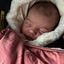 Lilyana a rejoint le concours — aidez-le/la à gagner de superbes lots ! baby, blanket, child, closeup, clothing, cozy, cute, face, fur, hood, indoor, infant, newborn, peaceful, pink, portrait, sleeping, soft, warm, wrapped