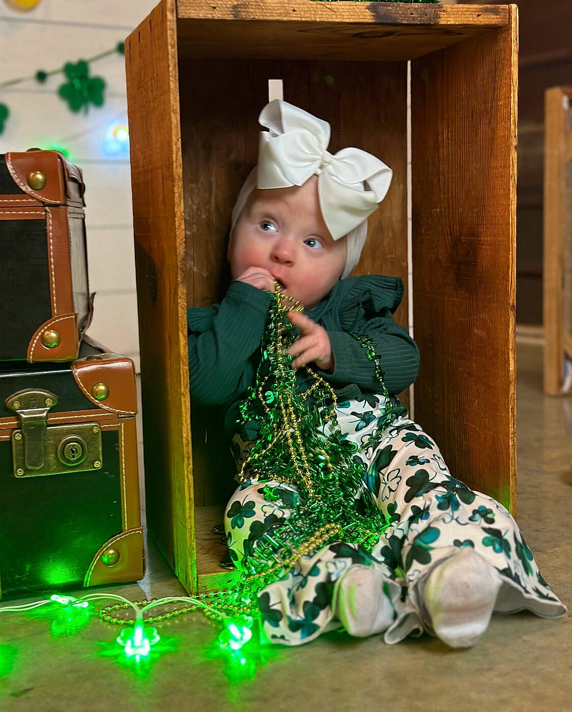 Lilliana joined the competition — help win amazing prizes! baby, child, christmas, christmas_eve, event, fashion_accessory, fashion_design, fun, hat, headwear, holiday, leisure, machine, person, recreation, room, sitting, sun_hat, toddler, tradition