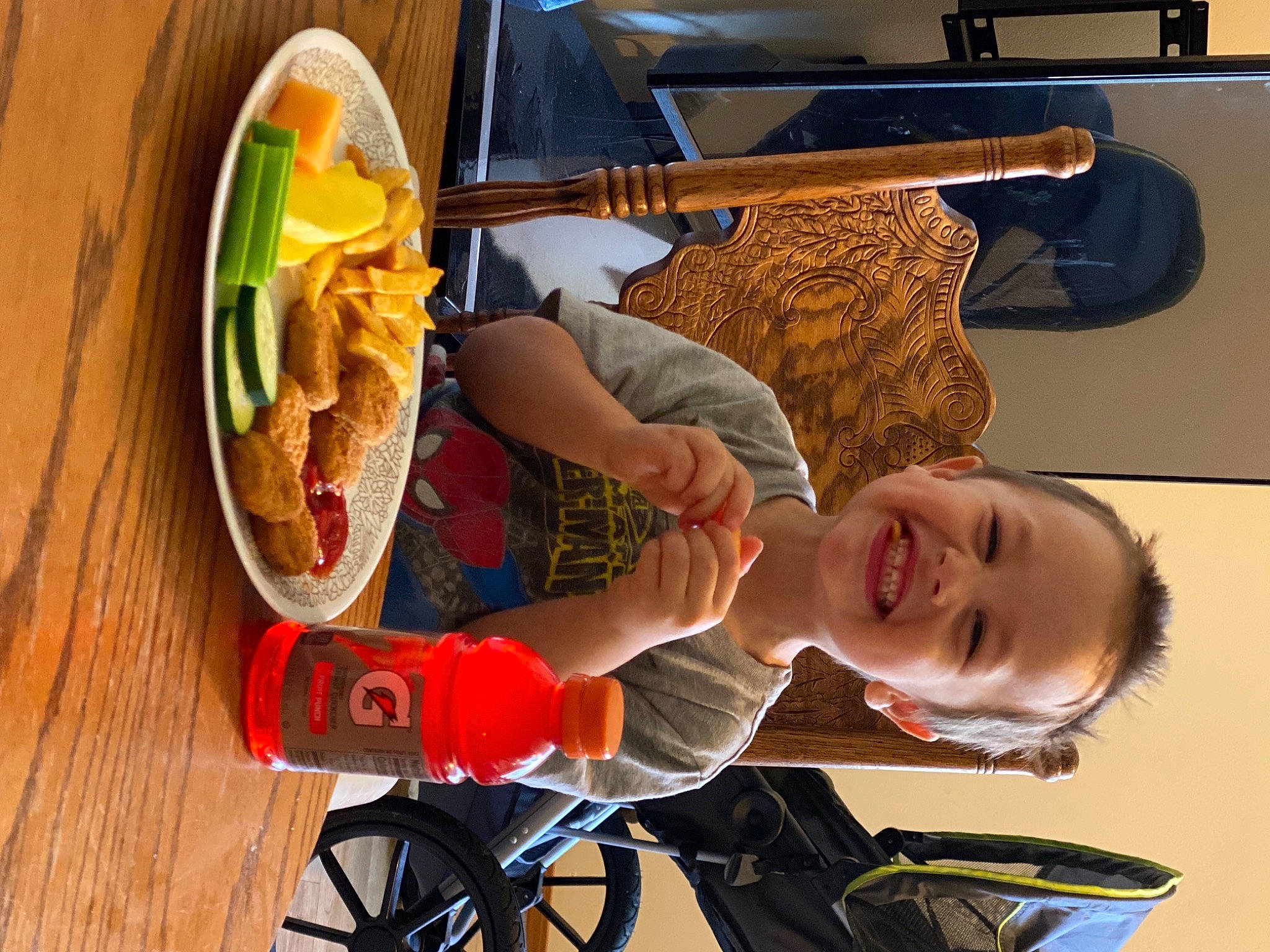 Connor is registered to the contest to win money with this photo: child, joy, junk_food, person, side_dish, wheelchair