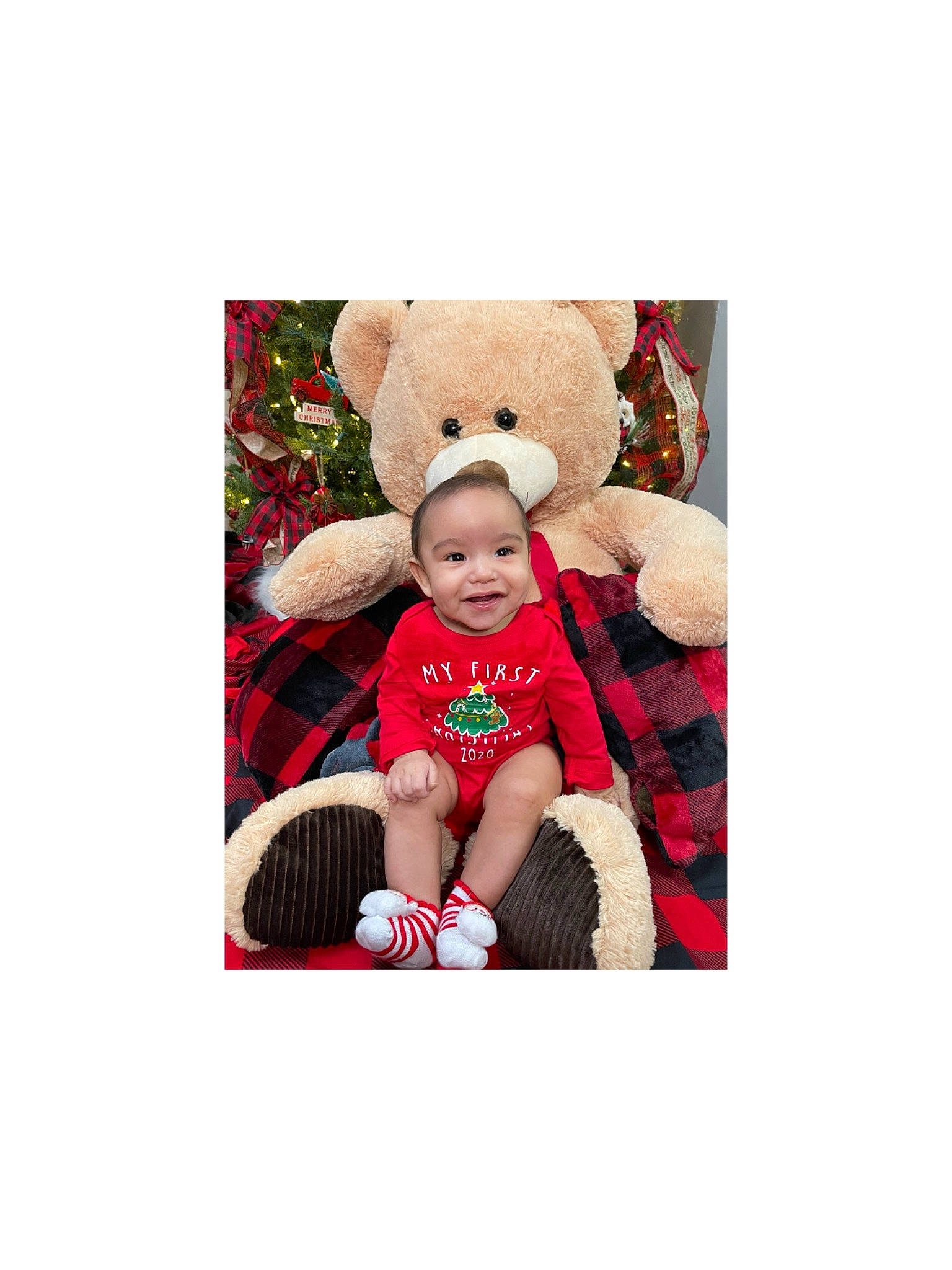 Jiovanni is registered to the contest to win money with this photo: baby, baby_products, baby_toddler_clothing, baby_toys, ball, beanie, bonnet, costume_accessory, football, human_body, joy, pattern, person, plaid, plush, soccer_ball, stuffed_toy, tartan, teddy_bear, toy