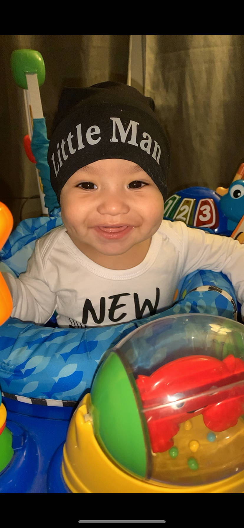 Jiovanni joined the competition — help win amazing prizes! baby, baby_playing_with_toys, baby_products, baby_toddler_clothing, baby_toys, balloon, beanie, cheek, child, cool, facial_expression, fun, happy, headgear, headwear, joy, mouth, party_supply, person, plastic
