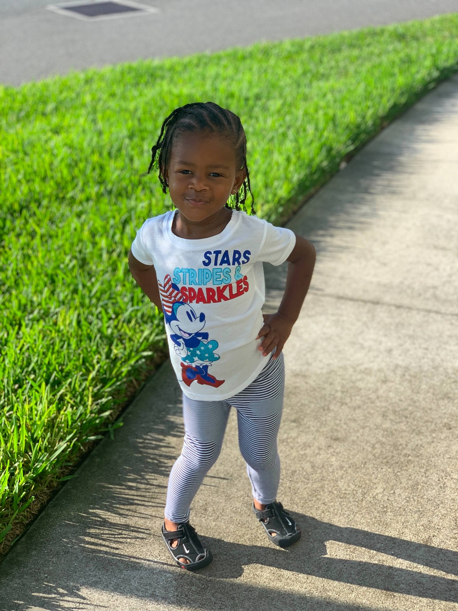 Raedyn is registered to the contest to win money with this photo: asphalt, child, fun, grass, green, happy, leisure, person, photography, plant, play, recreation, road, shoe, smile, t_shirt, toddler, tourism, vacation, walking