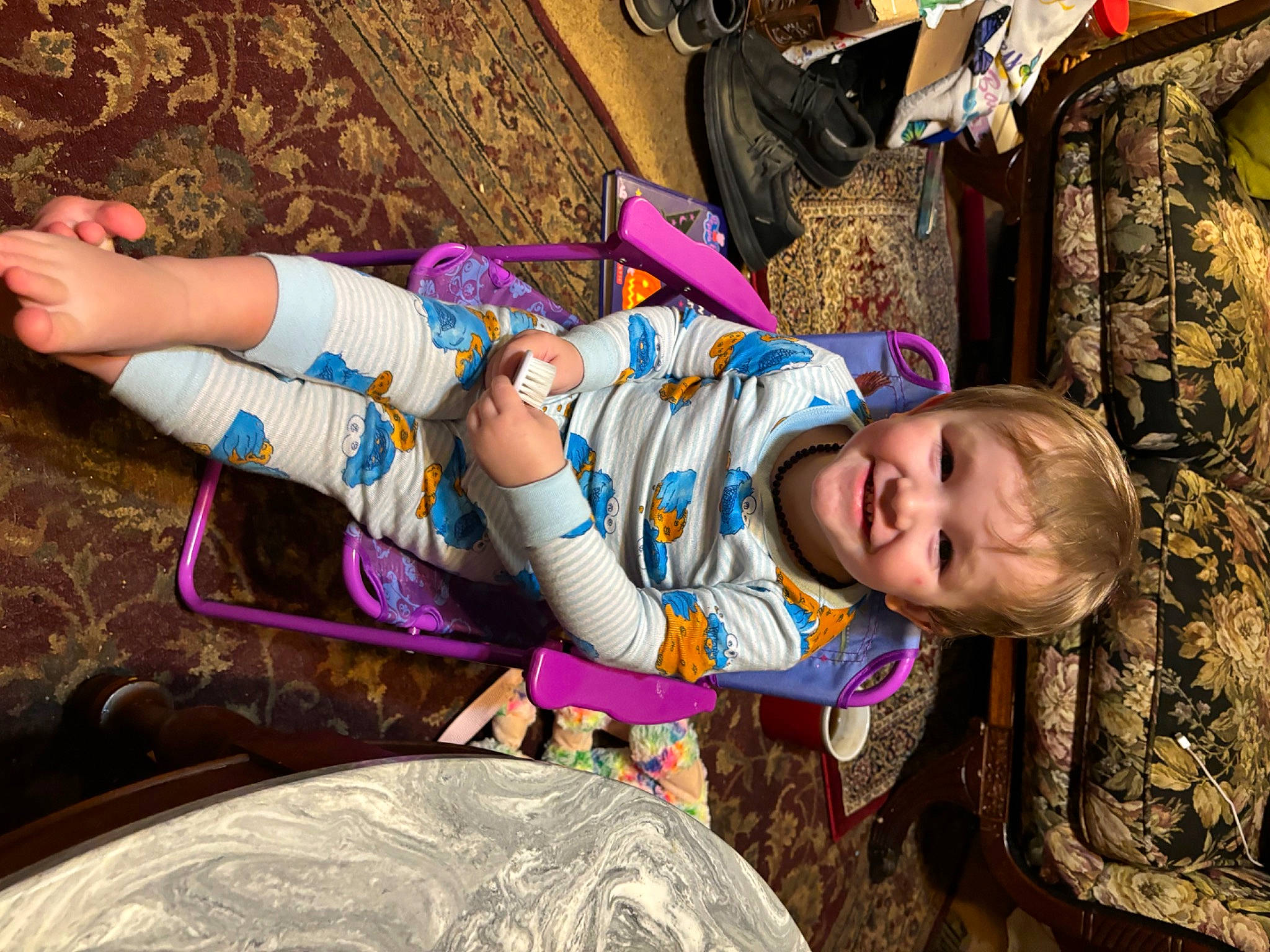 Lucas joined the competition — help win amazing prizes! child, facial_expression, fun, grass, happy, human_body, human_leg, joy, leisure, magenta, pattern, person, pink, plant, purple, sitting, smile, textile, toddler, tree