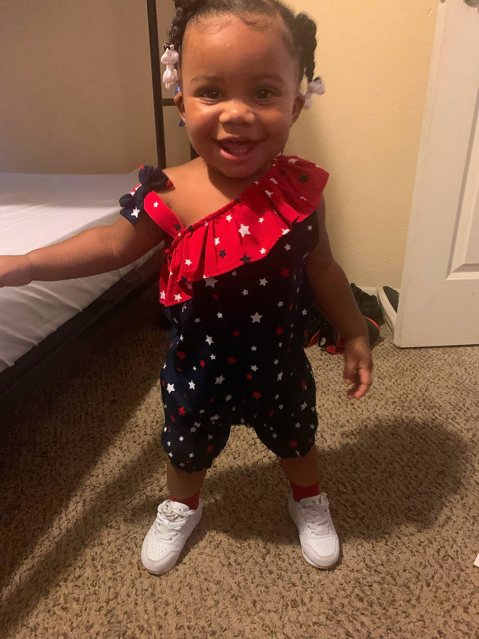 Leasia is registered to the contest to win money with this photo: baby, baby_toddler_clothing, cheek, child, chin, door, face, flooring, gesture, happy, head, human_body, joy, neck, pattern, person, skin, sleeve, smile, t_shirt