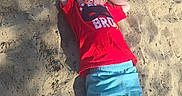 Parker joined the competition — help win amazing prizes! child, boy, sand, sunlight, shadow, relaxed, casual_clothing, outdoor, smiling, red_tshirt, blue_shorts, barefoot, summer, play, leisure, young, portrait, happy, nature, daylight