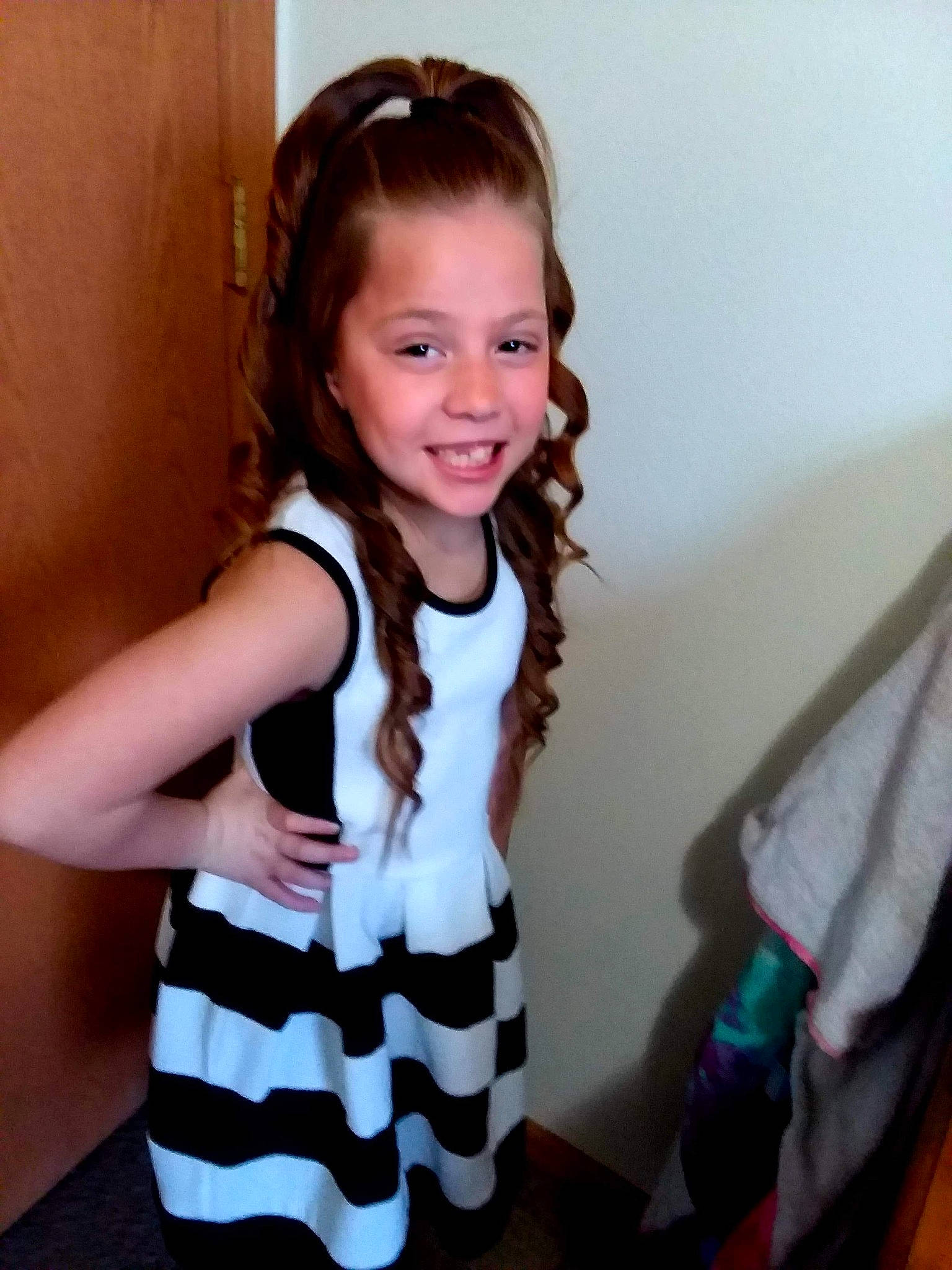 Kailianna is registered to the contest to win money with this photo: brown_hair, child, child_model, dress, joy, person, smile, toddler