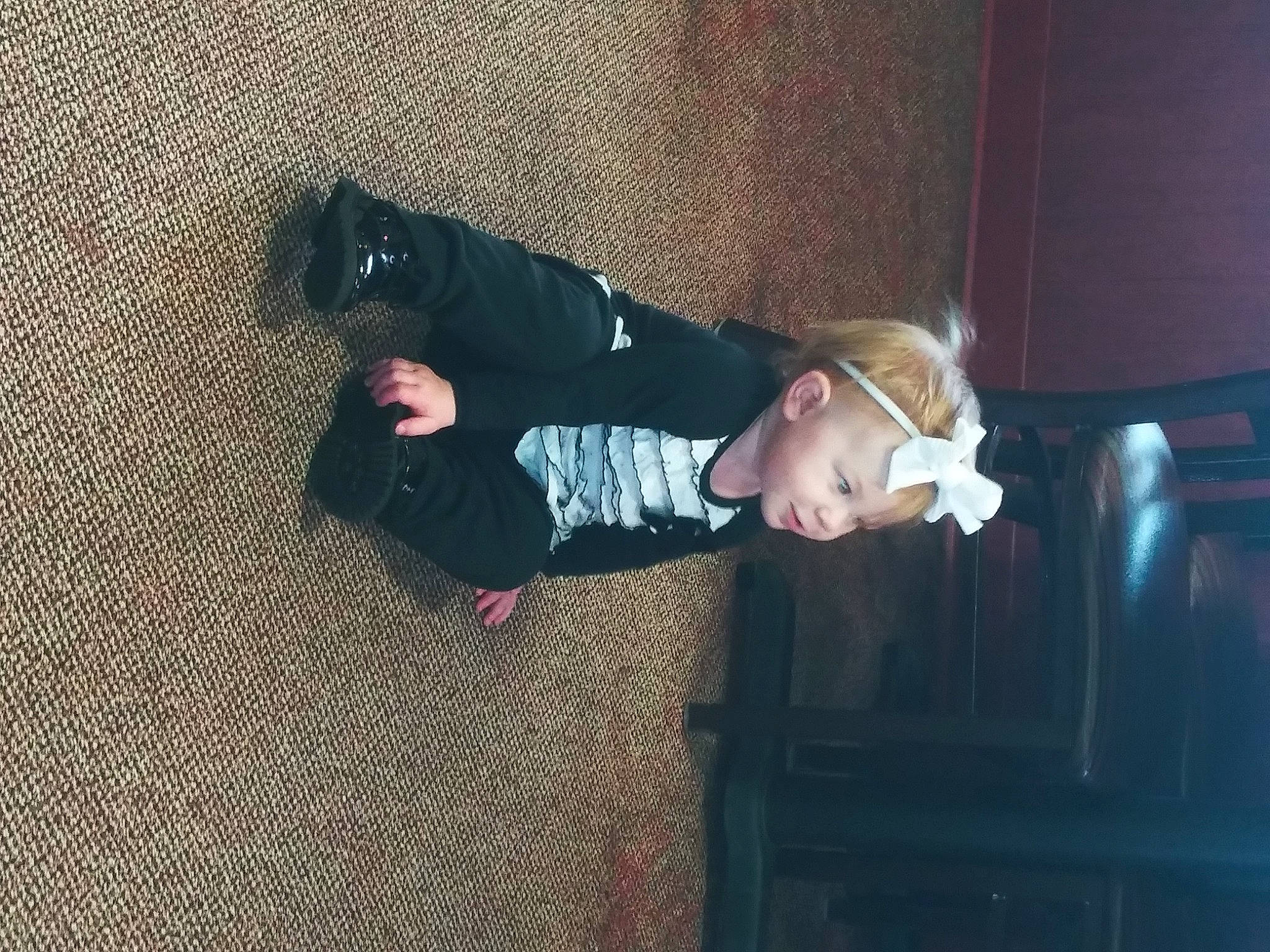 Mavis is registered to the contest to win money with this photo: baby_toddler_clothing, boot, child, comfort, darkness, flash_photography, floor, flooring, fun, human_leg, knee, magenta, person, room, sitting, toddler, tree, wood