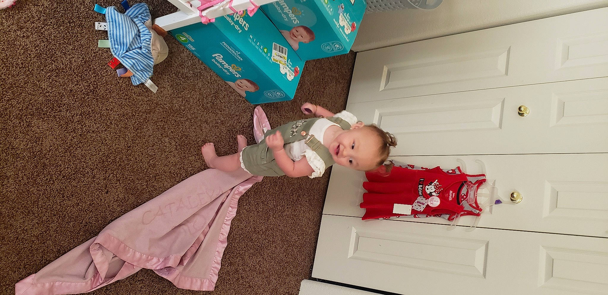 Cataleya is registered to the contest to win money with this photo: baby, baby_toddler_clothing, child, comfort, flooring, foot, fun, hat, holiday, human_leg, lap, leisure, person, pink, room, sandal, sitting, sock, textile, thigh