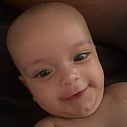 Zemira is registered to the contest to win money with this photo: baby, bare_shoulders, cheerful, child, closeup, cute, expression, face, happy, head, healthy, human, indoors, infant, lying_down, portrait, skin, skin_tone, smiling, young