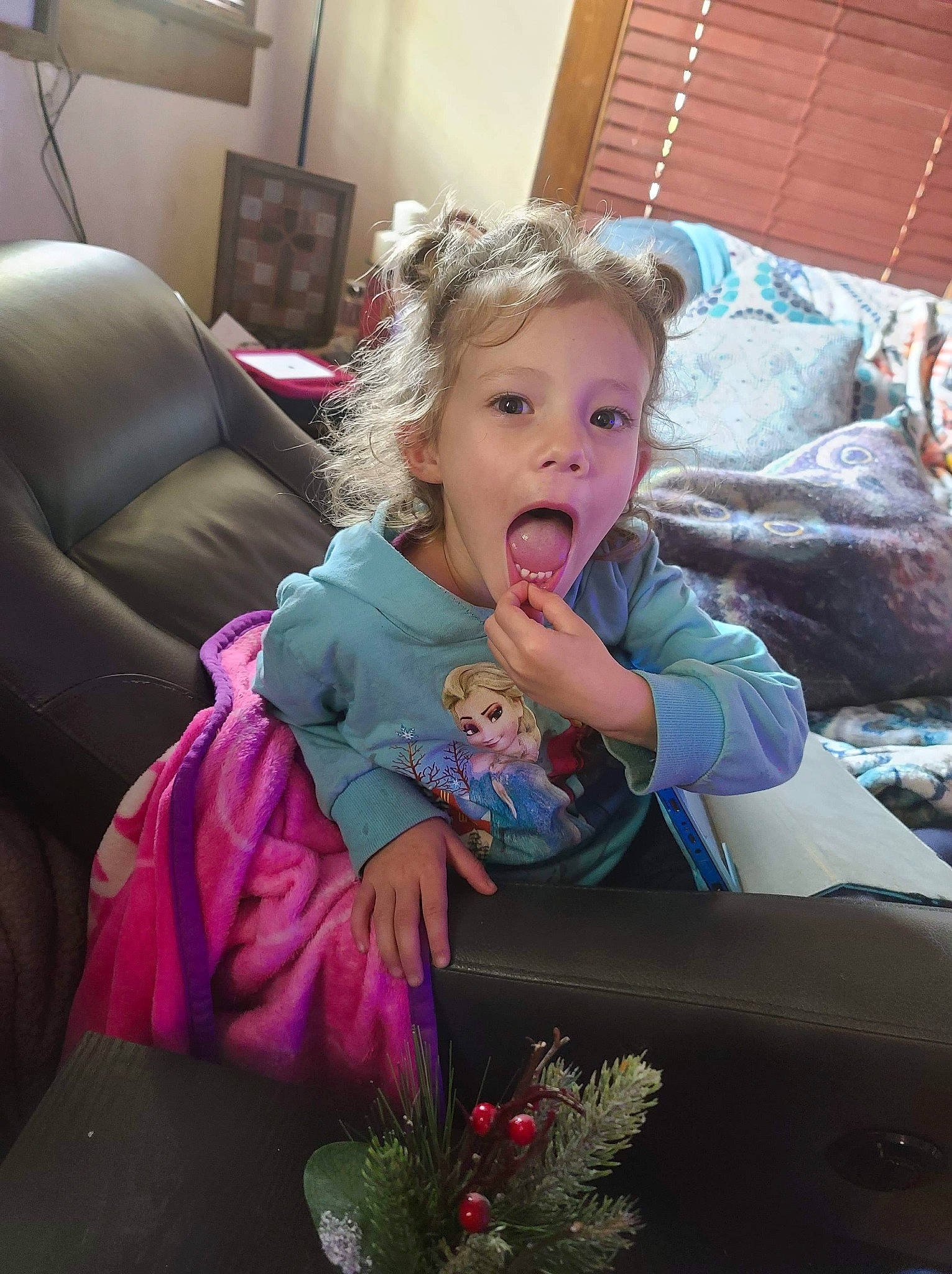 Kinleigh is registered to the contest to win money with this photo: child, comfort, event, eye, face, flooring, fun, happy, home, iris, leisure, living_room, mouth, people, person, picture_frame, pink, plant, room, sitting