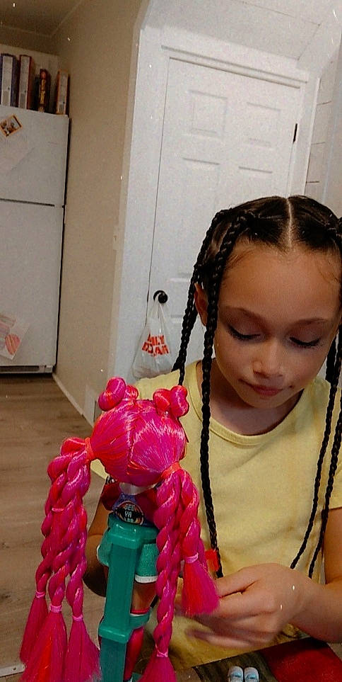 Giana is registered to the contest to win money with this photo: audio_equipment, braid, child, door, ear, eyelash, fashion_accessory, fun, gadget, hair_accessory, hair_tie, hand, happy, headphones, hearing, magenta, neck, peripheral, person, toddler