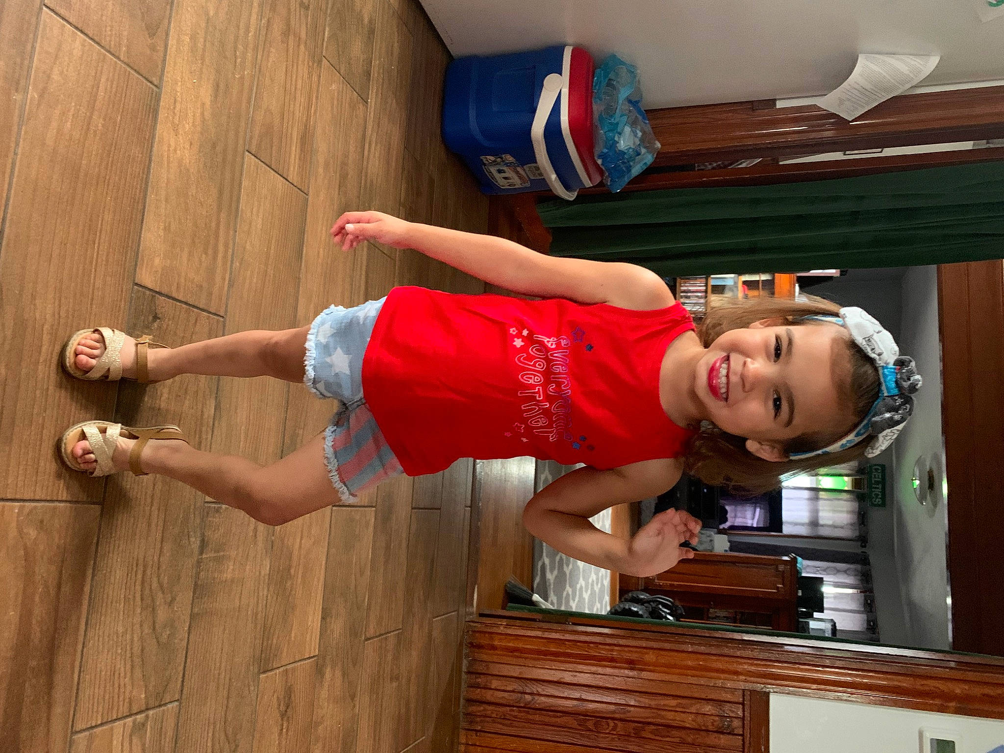 Amilya joined the competition — help win amazing prizes! balance, cabinetry, elbow, fun, hardwood, hat, human_leg, joint, joy, knee, muscle, person, room, shorts, smile, sportswear, standing, t_shirt, thigh, trunk
