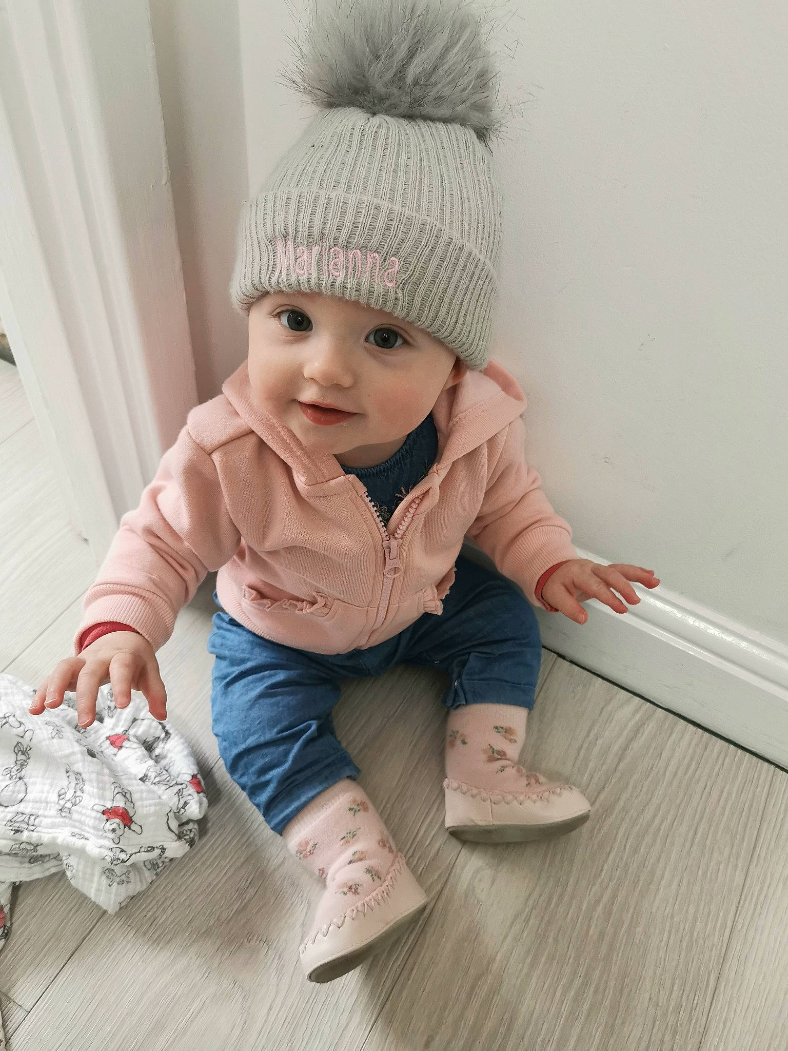 Marianna joined the competition — help win amazing prizes! baby, baby_toddler_clothing, cap, child, comfort, fashion_accessory, flooring, foot, hardwood, headwear, pattern, person, photograph, sitting, skin, sleeve, smile, standing, toddler, wood