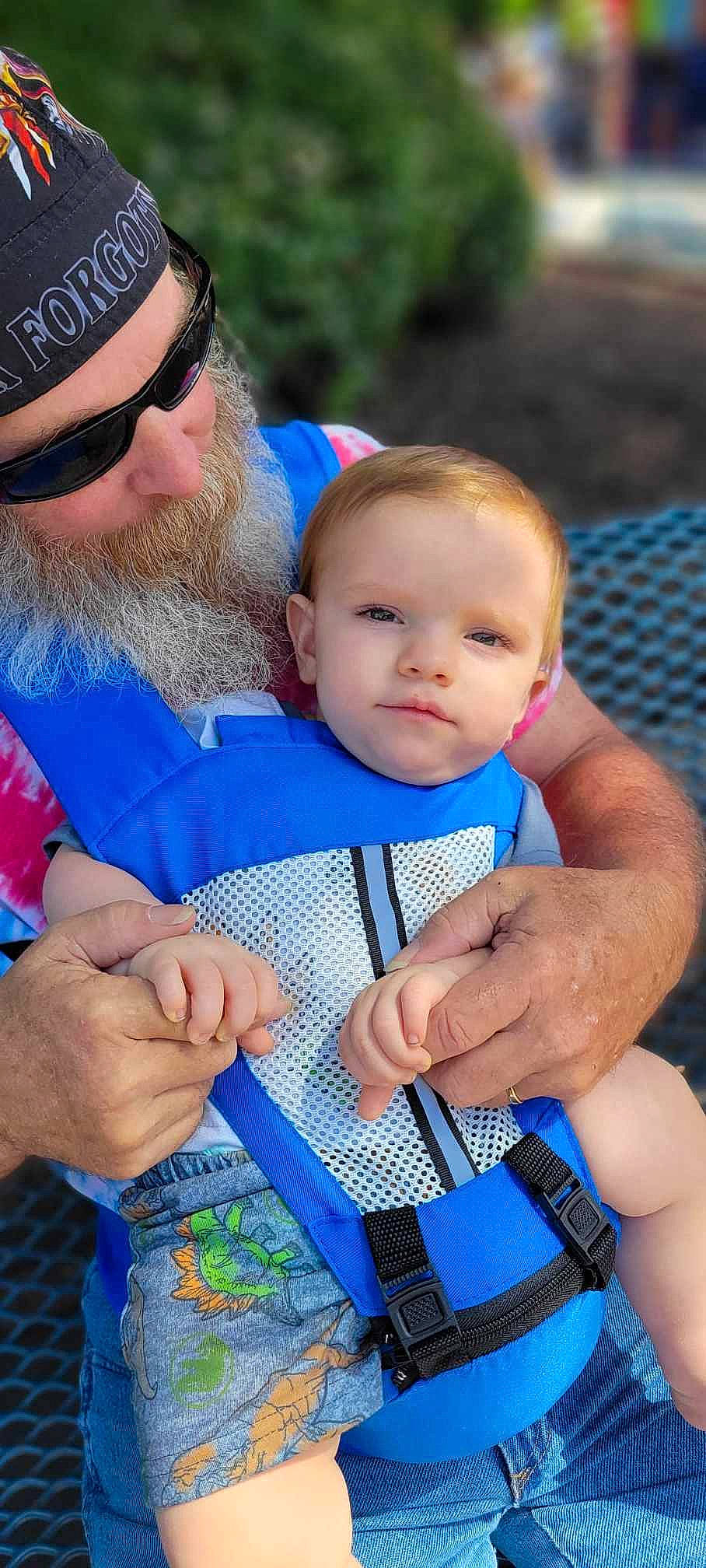Killian is registered to the contest to win money with this photo: azure, baby, baby_toddler_clothing, baseball_cap, beard, blue, cap, child, electric_blue, face, facial_expression, finger, gesture, goggles, hand, happy, hat, people, person, sunglasses