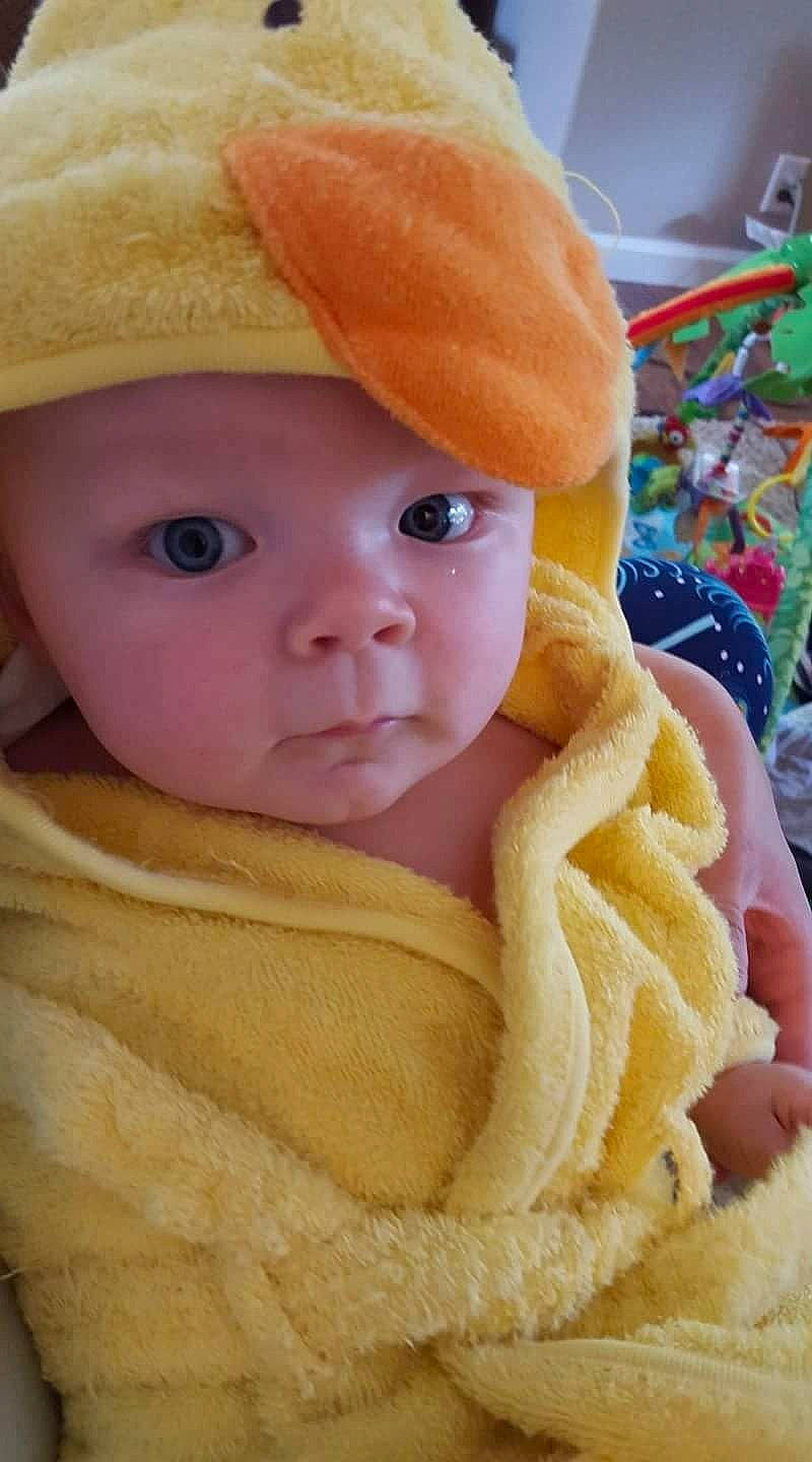 Graysen is registered to the contest to win money with this photo: cheek, child, doll, headgear, headwear, infant, person, plush, skin, stuffed_toy, textile, toddler, toy, yellow