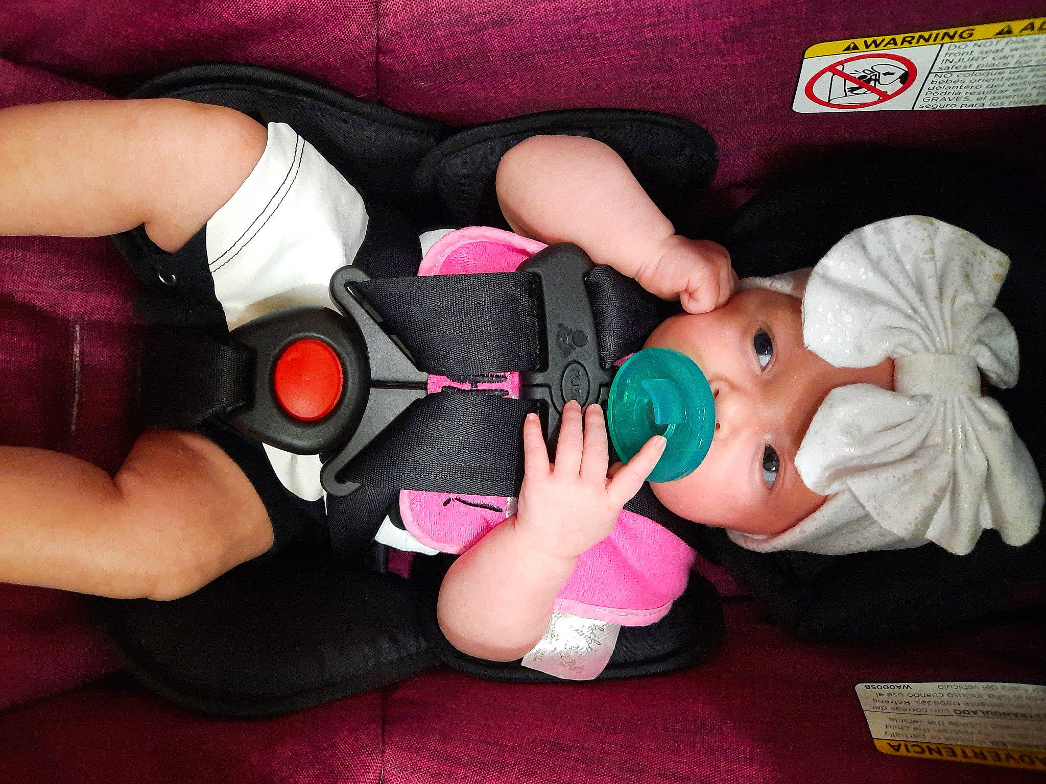 Tahlia is registered to the contest to win money with this photo: arm, baby, cheek, child, finger, footwear, hand, headwear, joint, lap, leg, nail, nap, person, pink, play, shoe, thigh, thumb, toddler