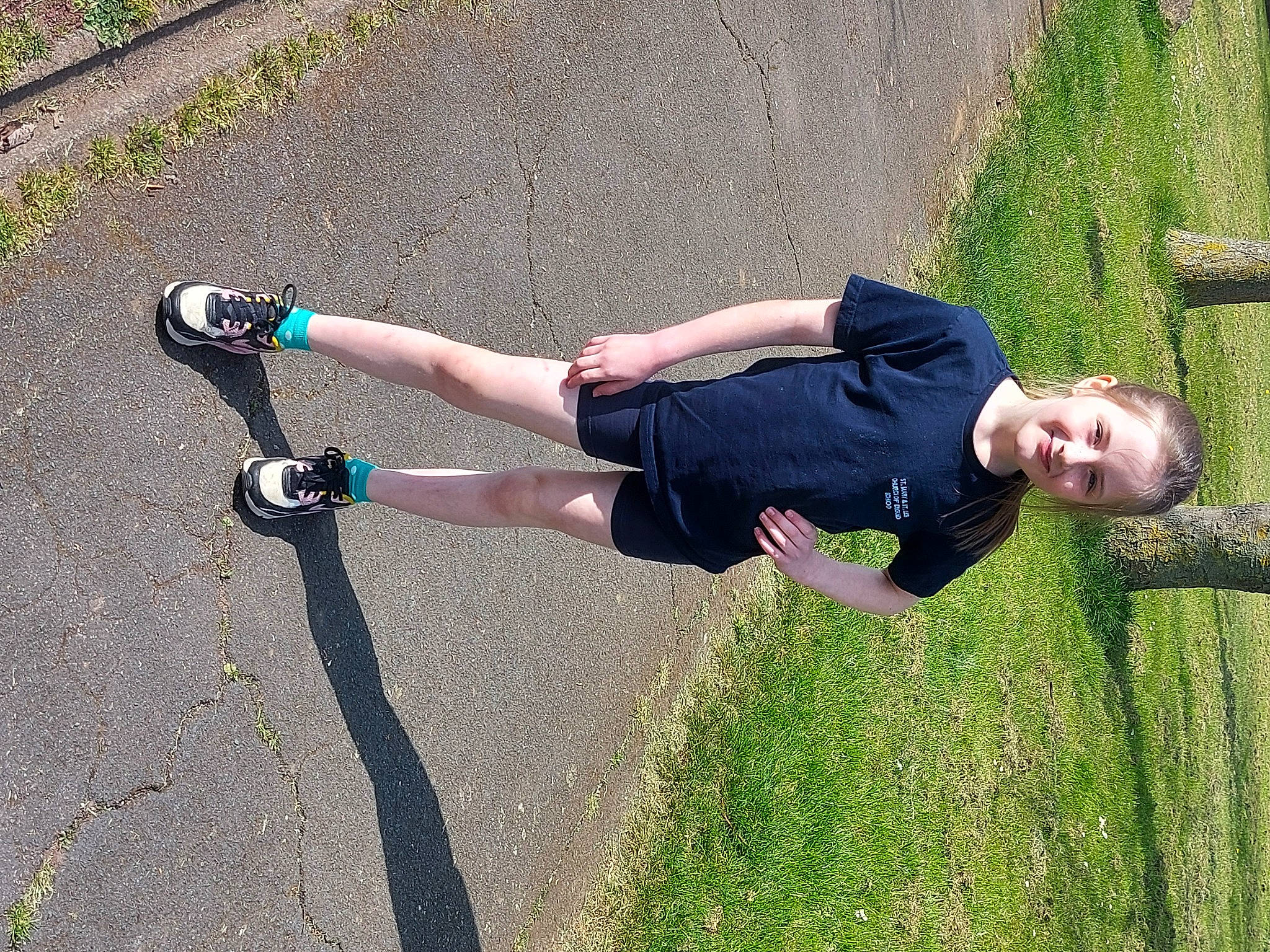 Isabelle joined the competition — help win amazing prizes! asphalt, concrete, elbow, electric_blue, fun, grass, human_leg, joy, knee, leg, leisure, people_in_nature, person, plant, recreation, road_surface, shadow, shorts, sneakers, tar