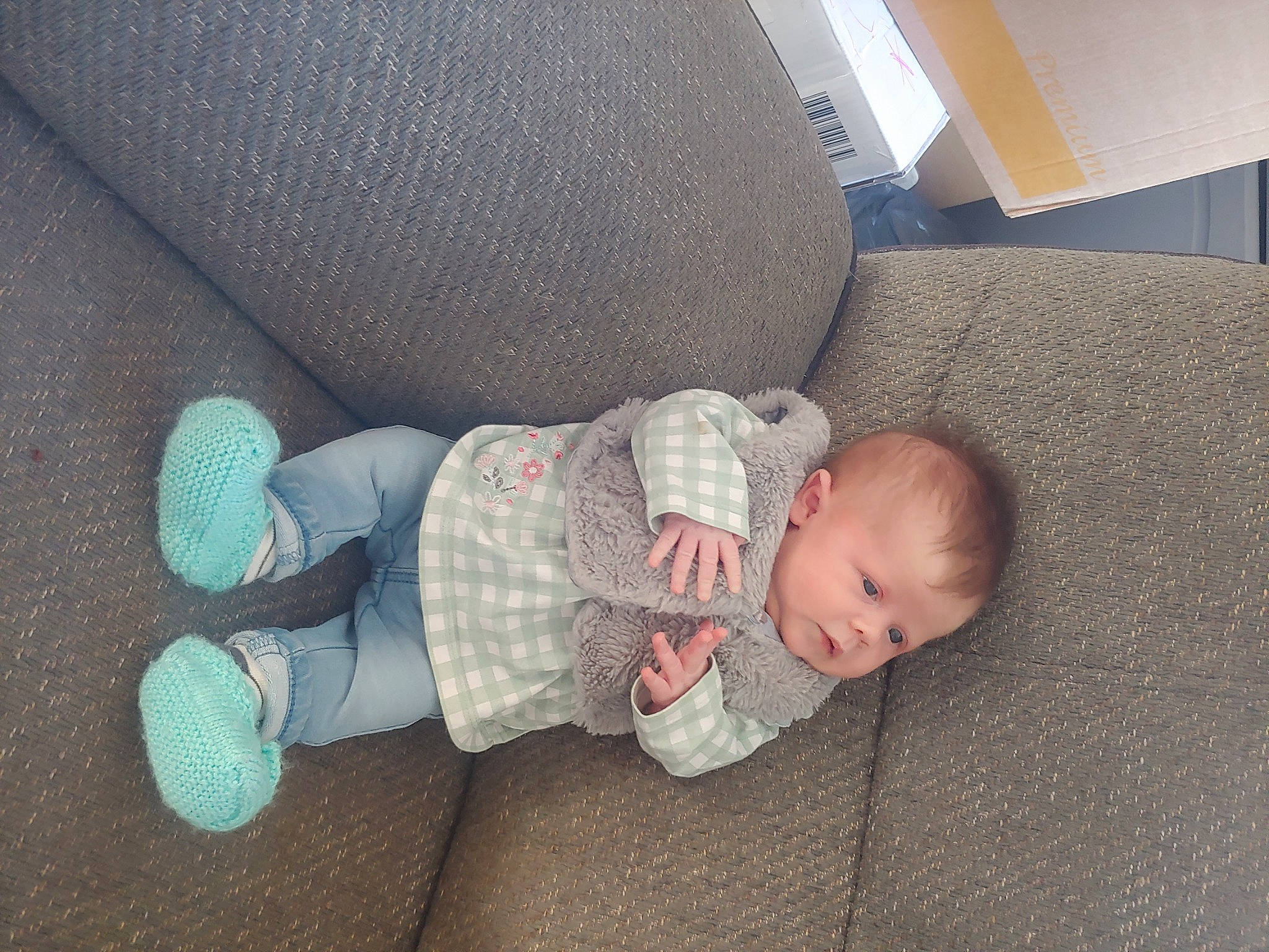 Evalynn joined the competition — help win amazing prizes! baby, baby_toddler_clothing, bedtime, child, comfort, couch, flooring, hardwood, lap, linens, nap, person, room, sitting, sleep, sock, toddler, wood, wood_flooring