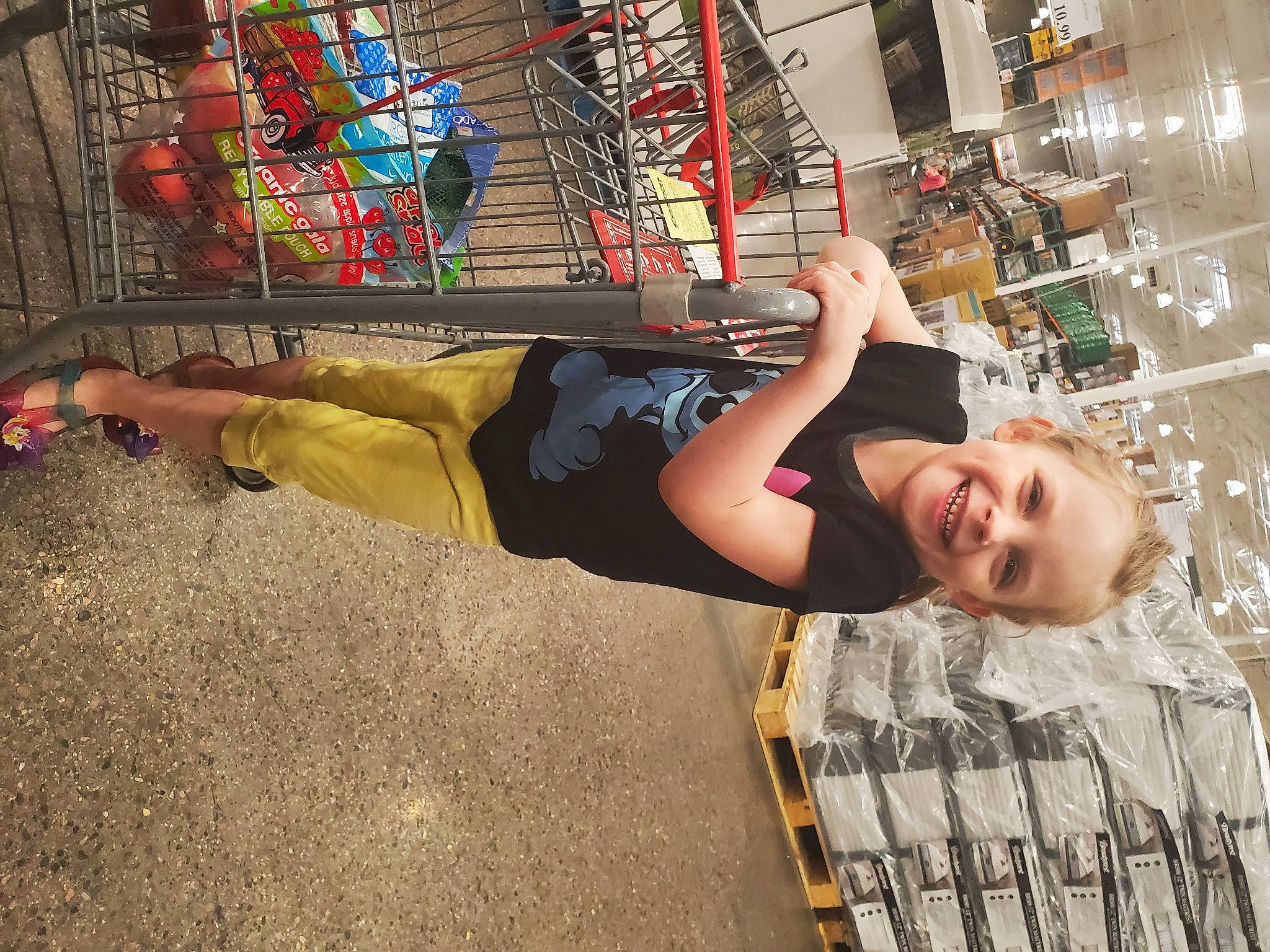 Scarlett is registered to the contest to win money with this photo: art, city, cool, fun, happy, human_leg, joy, leisure, person, recreation, shorts, sitting, smile, sportswear, street, t_shirt, thigh, visual_arts