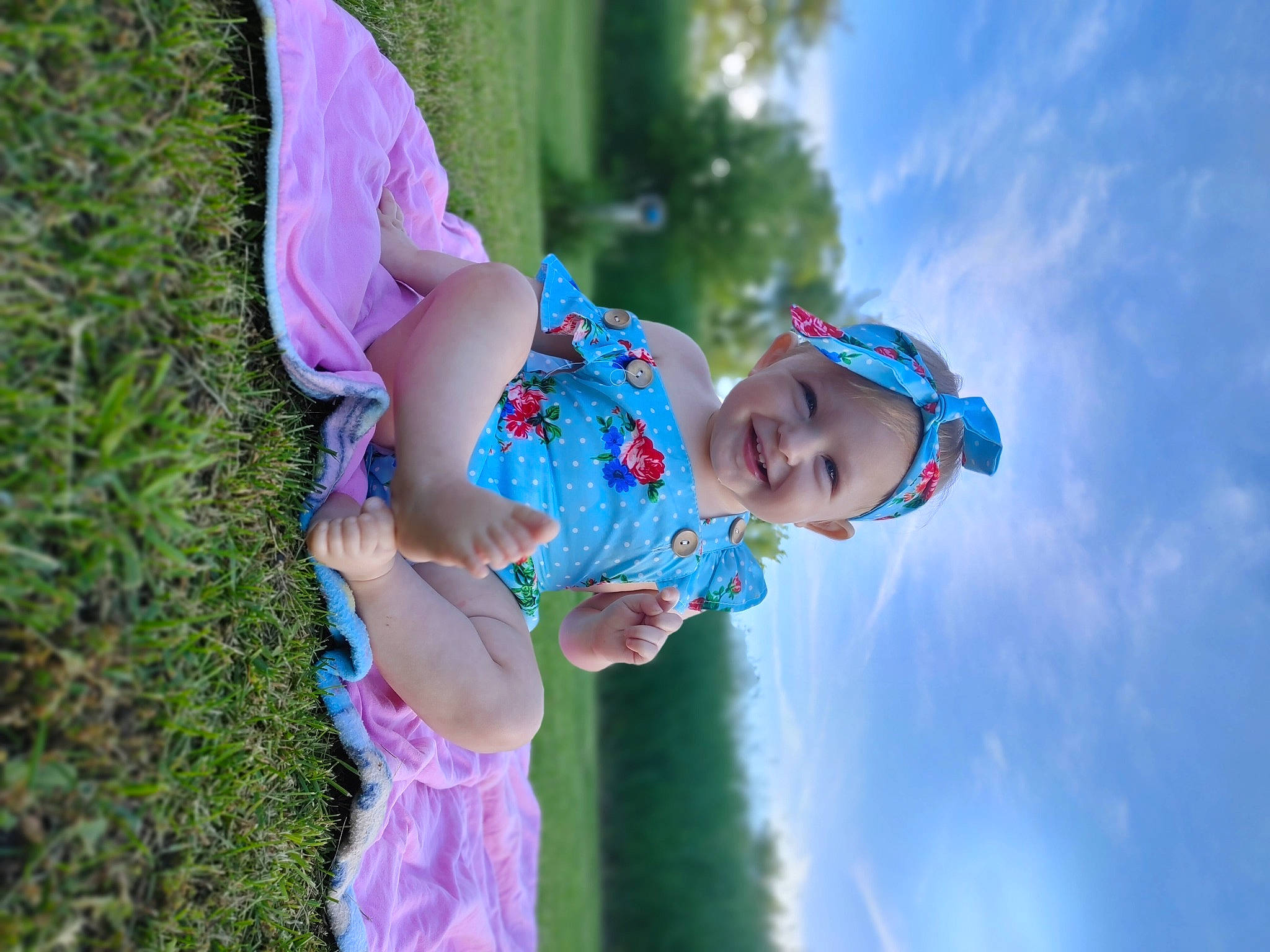 Saphirah is registered to the contest to win money with this photo: baby, baby_toddler_clothing, cloud, electric_blue, flash_photography, fun, grass, happy, headwear, joy, leaf, leisure, magenta, people_in_nature, person, pink, purple, recreation, sky, smile