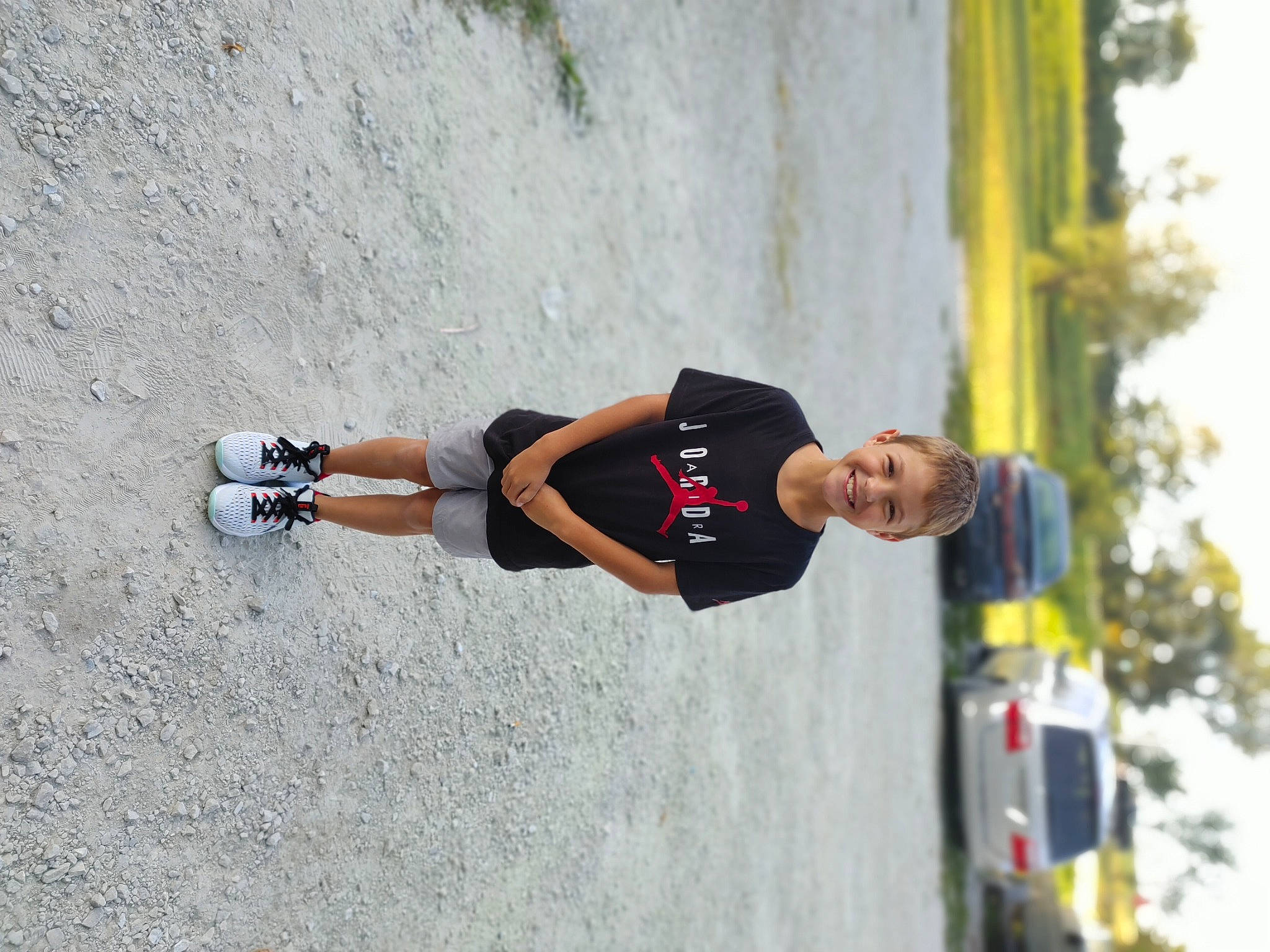 Aidyn is registered to the contest to win money with this photo: adventure, asphalt, car, concrete, extreme_sport, fun, joy, leisure, outdoor_shoe, pedestrian, person, recreation, rolling, shorts, smile, sports, sportswear, street, street_fashion, t_shirt