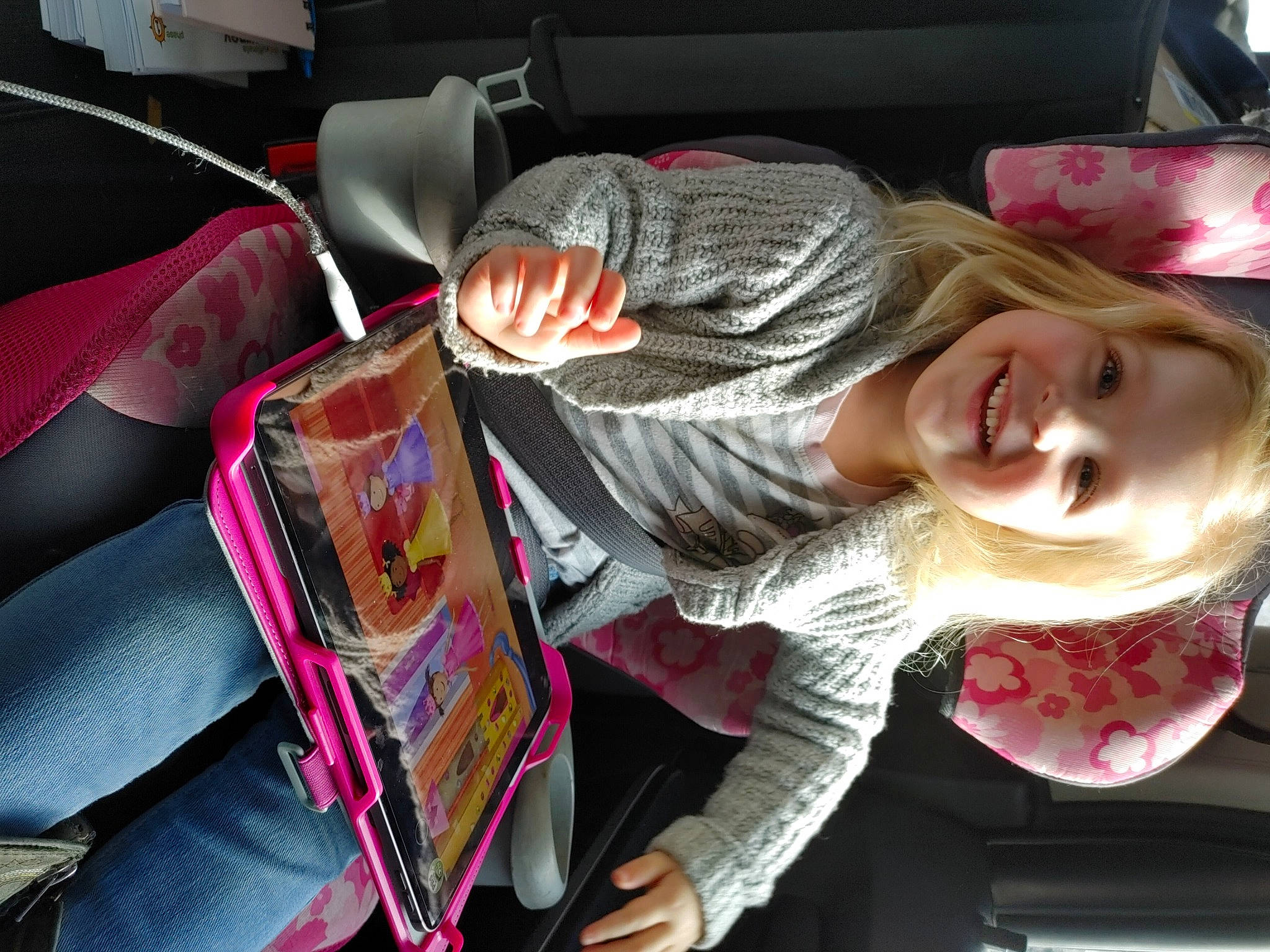 Ezriah joined the competition — help win amazing prizes! auto_part, automotive_design, car_seat, car_seat_cover, child, comfort, cool, fun, human_leg, joy, luxury_vehicle, magenta, motor_vehicle, mouth, passenger, person, sitting, smile, steering_wheel, textile